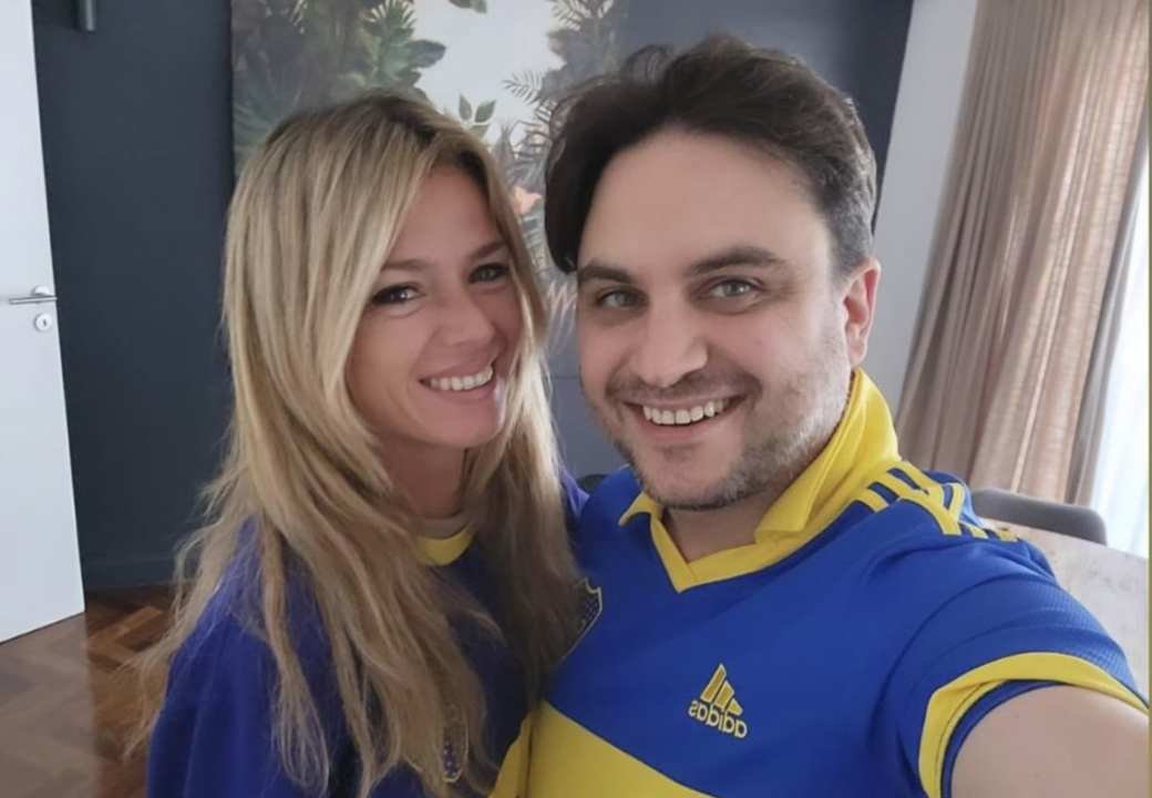 Camila Giorgi and Ramiro Marra wearing Boca Juniors jerseys
