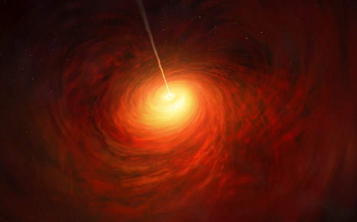 This artist’s impression depicts the black hole at the heart of the enormous elliptical galaxy Messier 87 (M87). This black hole was chosen as the object of paradigm-shifting observations by the Event Horizon Telescope. The superheated material surrounding the black hole is shown, as is the relativistic jet launched by M87’s black hole.
