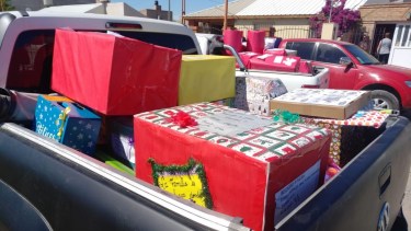 Las cajas saliendo a destino de las familias carenciadas.