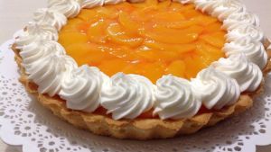 Manos a la masa para esta tarta de duraznos