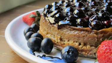 Cheesecake de batata con compota de arándanos