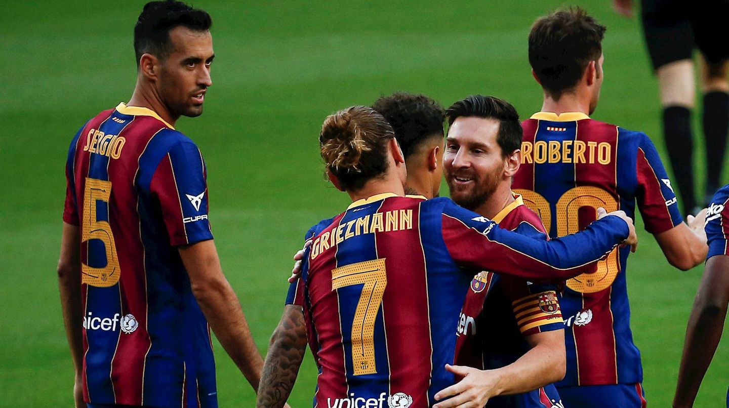 Messi saluda a Griezmann, autor del único gol del encuentro
