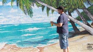 No pudo ir a Brasil y se hizo el mural de la playa en su casa en Roca