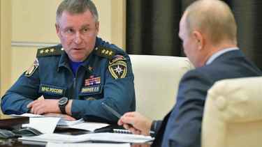 Yevgueni Zínichev, el ministro fallecido, en una reunión con Putin.  