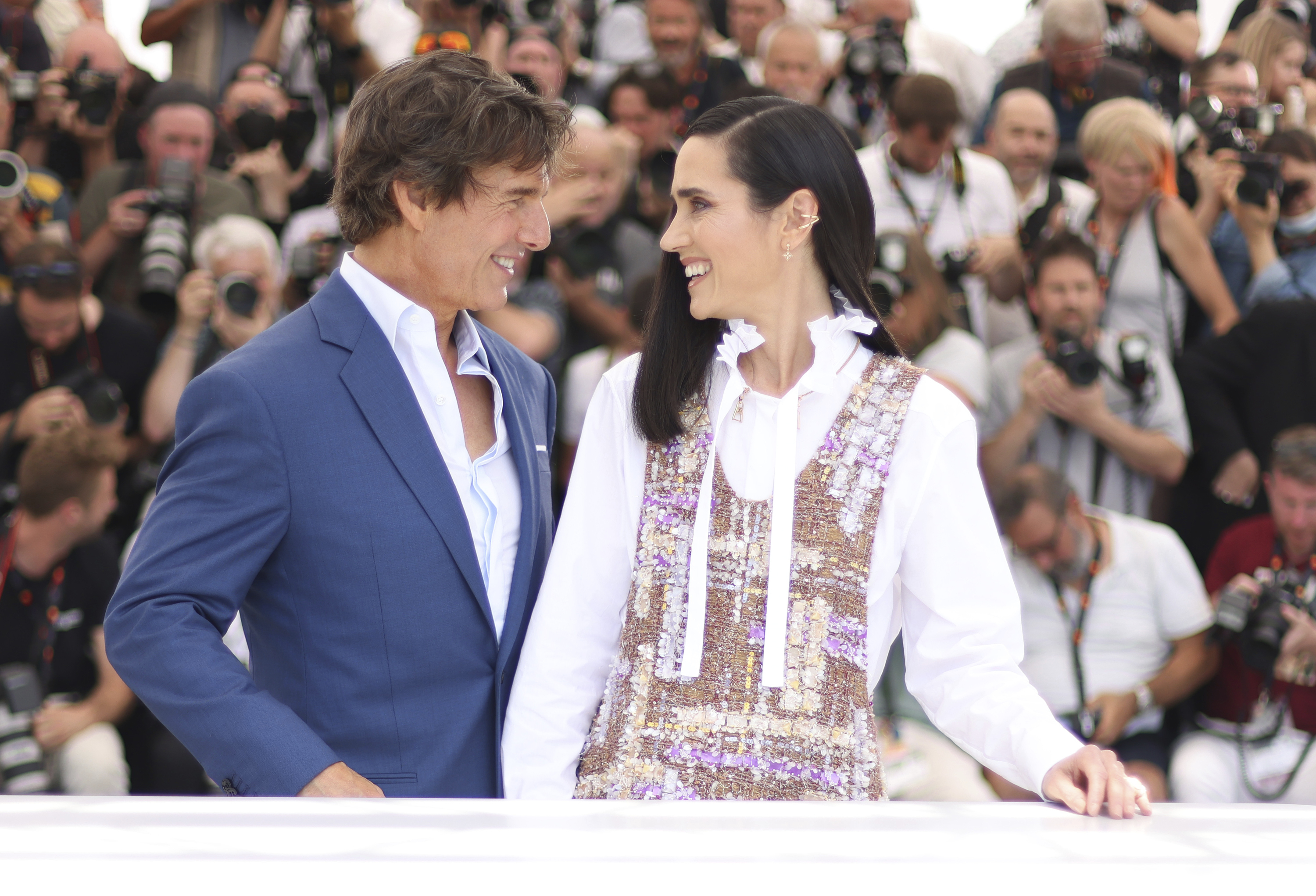 Tom Cruise, left, and Jennifer Connelly pose for photographers at the photo call for the film 'Top Gun: Maverick' at the 75th international film festival, Cannes, southern France, Wednesday, May 18, 2022. (Photo by Vianney Le Caer/Invision/AP)
