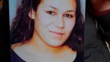 La foto de Claudia en un retrato en la casa de su familia. 