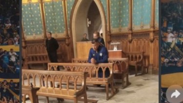 Se viralizó una foto de Almirón en la Basílica de Luján.