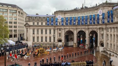 The Procession of King Charles travels to Westminster Abbey for the coronation of King Charles III in London, Saturday, May 6, 2023. (Adam Gerrard/Pool Photo via AP)