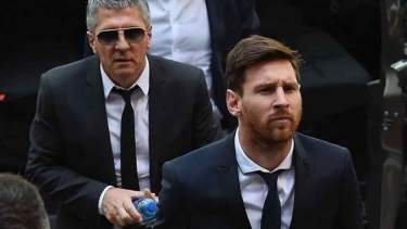 Lionel Messi junto a su papá, Jorge.