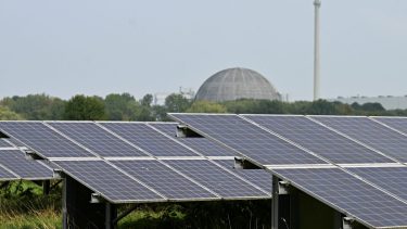 FILE PHOTO: A general view of a solar park in-front of the Unterweser Nuclear Power Plant in Stadland, Germany August 26, 2022. REUTERS/Benjamin Westhoff