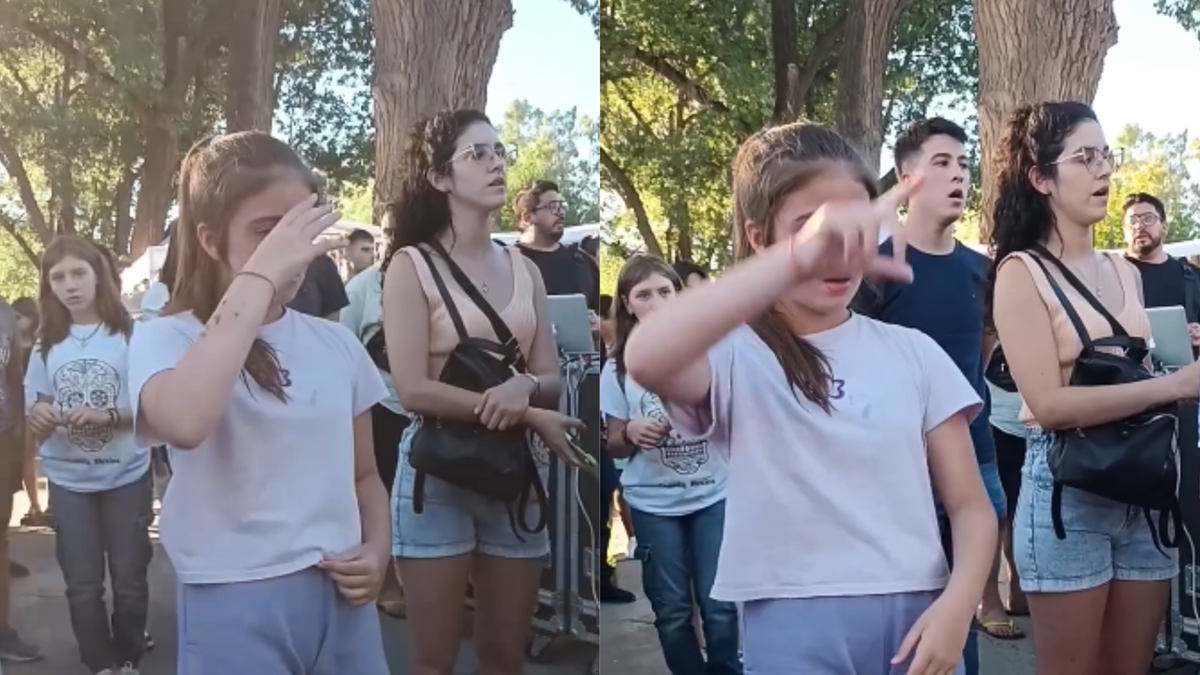 Emilia, en la Fiesta de la Pera 2024, emocionó a todos al interpretar el Himno Nacional en lengua de señas. Foto Captura.