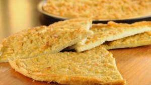 Animate a probar fainá gratinada con mozzarella y espinacas