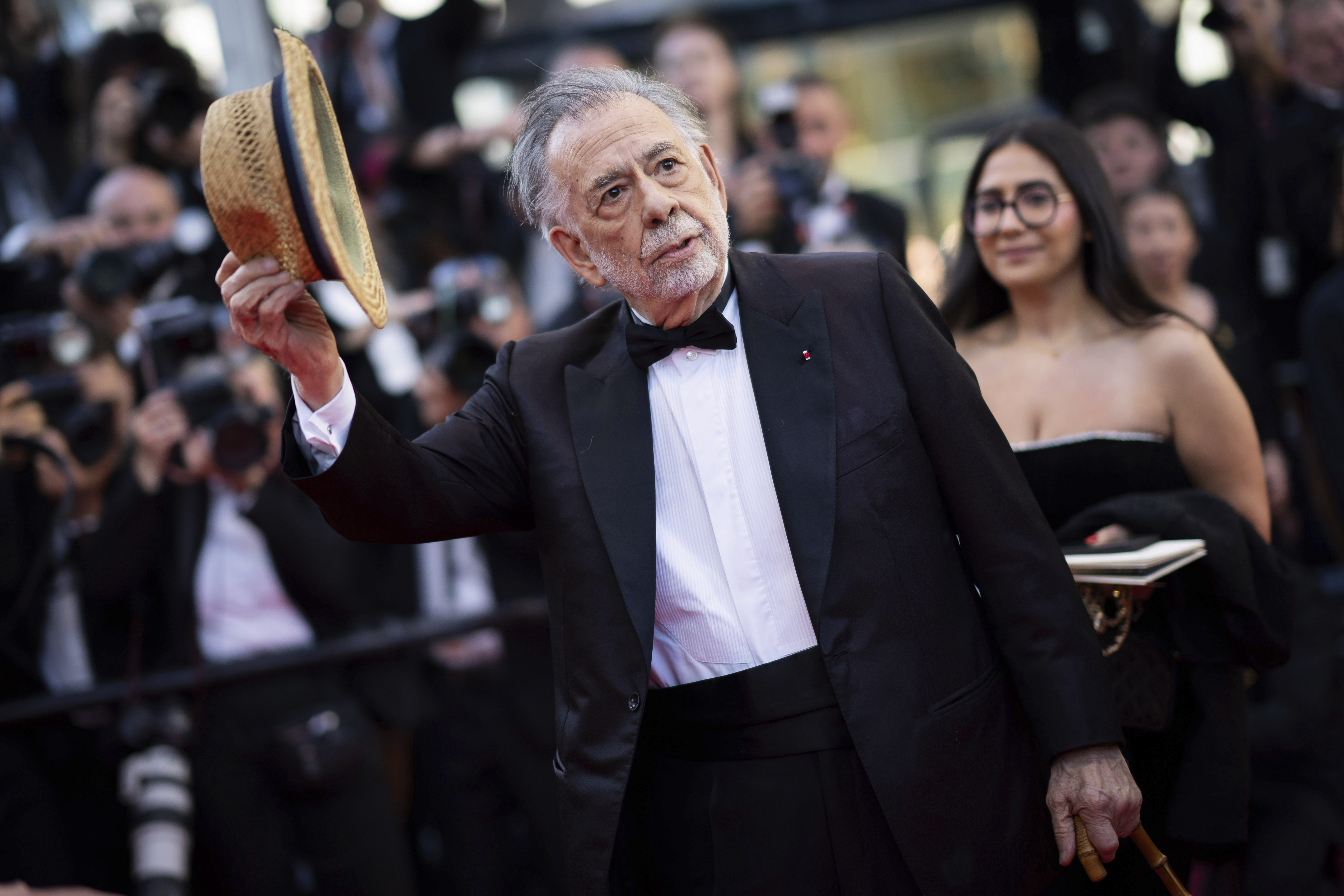 Director Francis Ford Coppola poses for photographers upon arrival at the premiere of the film 'Megalopolis' at the 77th international film festival, Cannes, southern France, Thursday, May 16, 2024. (Photo by Scott A Garfitt/Invision/AP)