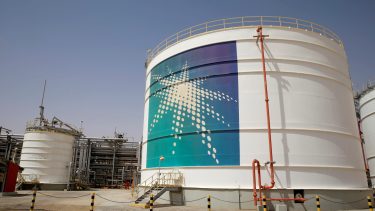 FILE PHOTO: An Aramco oil tank is seen at the Production facility at Saudi Aramco's Shaybah oilfield in the Empty Quarter, Saudi Arabia May 22, 2018. Picture taken May 22, 2018. REUTERS/Ahmed Jadallah