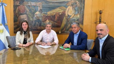 Rolando Figueroa con Luis Caputo.