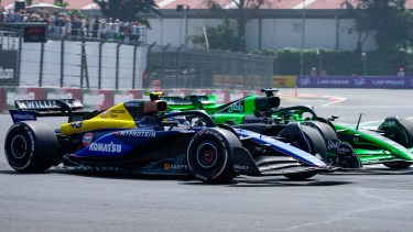 Williams driver Franco Colapinto, of Argentina, front, and Kick Sauber driver Valtteri Bottas, of Finland, steer through a turn during the first free practice ahead of the Formula One Mexico Grand Prix auto race at the Hermanos Rodriguez racetrack in Mexico City, Friday, Oct. 25, 2024. (AP Photo/Moises Castillo)