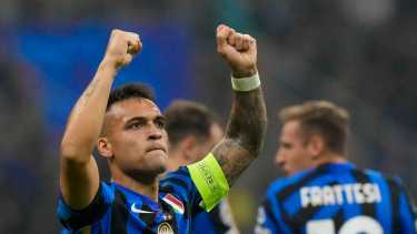 Inter Milan's Lautaro Martinez celebrates after scoring his side's third goal during the Champions League opening phase soccer match between Inter Milan and Red Star, at the San Siro stadium in Milan, Italy, Tuesday, Oct. 1, 2024. (AP Photo/Luca Bruno)