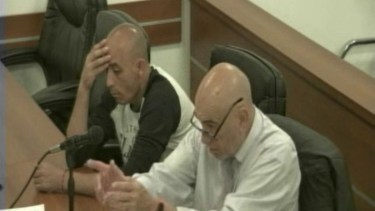 El defensor Varela junto al cabo Erice, acusado de lesiones graves agravadas (Captura de video)