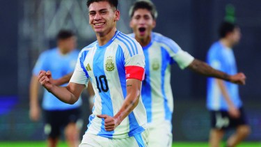 Argentina's midfielder #10 Claudio Echeverri celebrates scoring his team's second goal during the 2025 South American U-20 football championship final round match between Uruguay and Argentina at the Brígido Iriarte stadium in Caracas on February 7, 2025. (Photo by Edison GAMEZ / AFP)