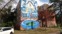 Imagen de Mural gigante en un monoblock de Cipolletti: tres pisos y un pedacito de Buenos Aires