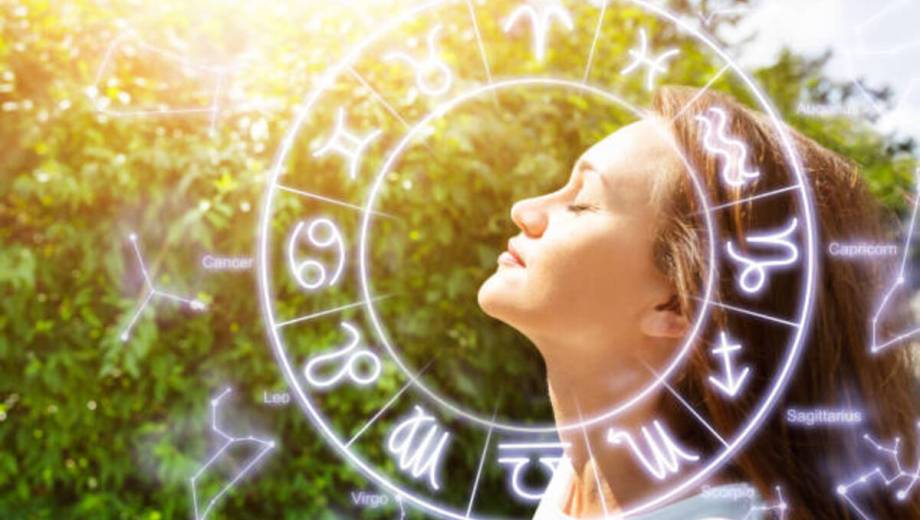 Side View Of Beautiful Young Woman Closing Her Eyes And Breathing Clean Fresh Air