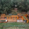 Imagen de Ni ladrillos ni hormigón: la revolución de las casas de madera llega al boom de un paraíso de la costa