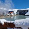 Imagen de Mapa | Cómo llegar al pueblo de la Patagonia que cada invierno queda sepultado por la nieve y tiene termas al pie de un volcán