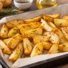 Imagen de Papas al horno perfectas: el truco con un solo elemento para que no se peguen y queden doradas sin aceite