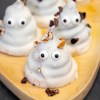 Imagen de Conitos de chocolate blanco y dulce de leche en 5 pesos versión Halloween